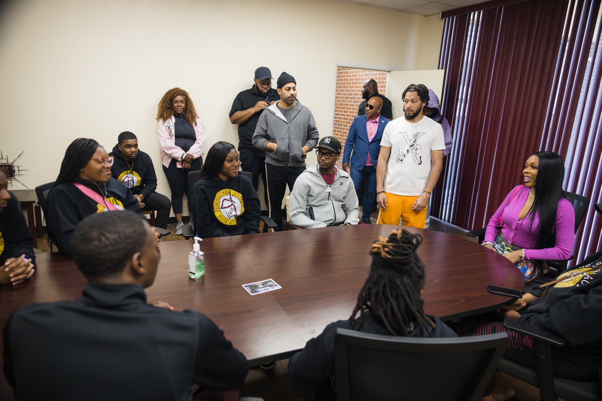 Campus roundtable with students, organizers, and visiting talent